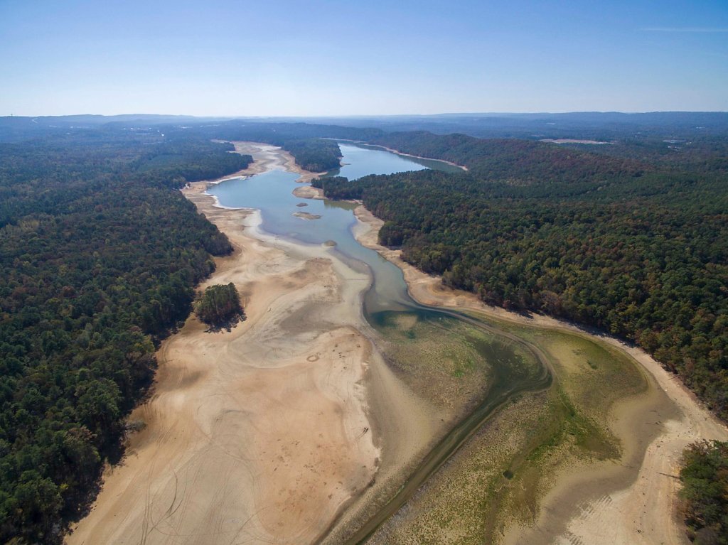 An aerial photo of Lake Purdy, showing very little water remaining. Most of the dry lake bed is visible.