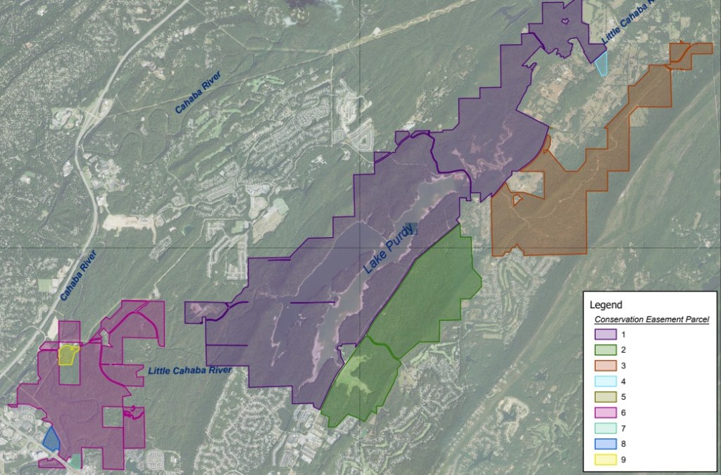 An overhead map of the Lake Purdy area and its tributaries to the Cahaba. Several parcels of protected land are outlined around the lake and rivers, while most of the unprotected land is developed by homes or commercial buildings.